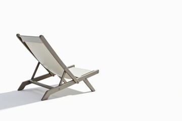 Relaxing in a simple lounge chair under sunlight