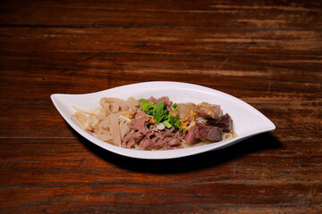 Delicious beef noodle soup local market food photography rustic setting close-up culinary delight