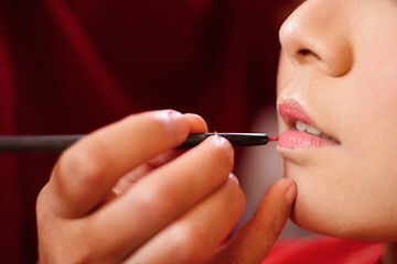 close up of bride wearing lip color