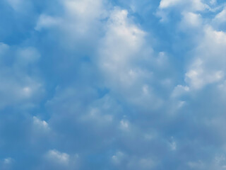 blue sky with white cumulus clouds