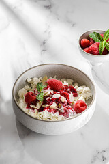 cottage cheese with raspberries and almond petals
