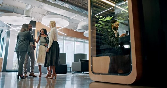 Collaboration, handshake and smile of business people in lobby with pod for b2b deal or success. Conversation, meeting and teamwork with group of employees shaking hands in workplace for agreement