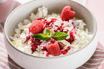 cottage cheese with raspberries and almond petals