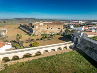 Aerial view of Olivenza's fortifications, a blend of Portuguese and Spanish styles, feature robust...
