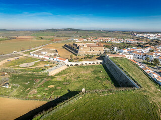 Aerial view of Olivenza's fortifications, a blend of Portuguese and Spanish styles, feature robust walls, imposing gates, and a formidable castle