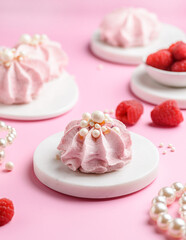 berry marshmallows on a pink background