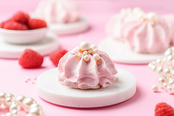 berry marshmallows on a pink background