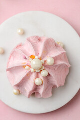 berry marshmallows on a pink background