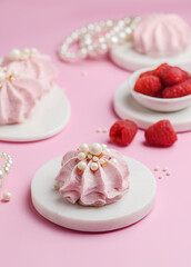 berry marshmallows on a pink background
