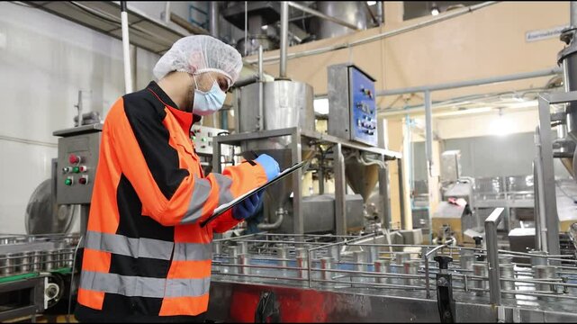 Engineer team working check service maintenance machine operation for safety in food factory production line