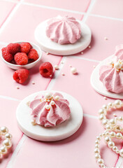 berry marshmallows on a pink background