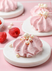 berry marshmallows on a pink background