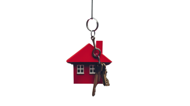 Red miniature house keychain hanging with keys on transparent background