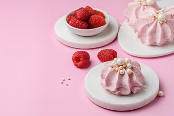 berry marshmallows on a pink background