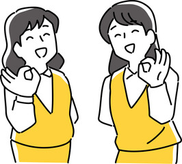 okポーズをとる2人の女性