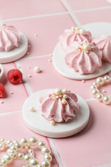 berry marshmallows on a pink background
