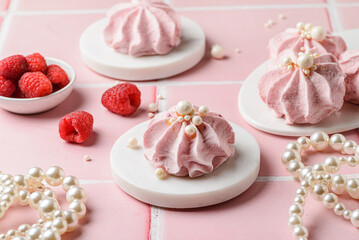 berry marshmallows on a pink background