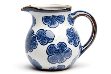 White and blue ceramic pitcher standing on white background