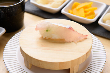 Sushi on a wooden plate
