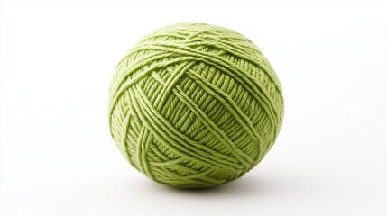 Fototapeta premium A round ball of natural threads of emerald color on a white background