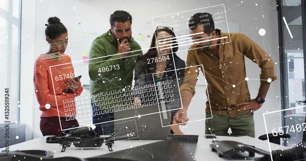 Poster analyzing data with digital interface, diverse team collaborating in modern office