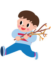 キャンプで薪を集める男の子
