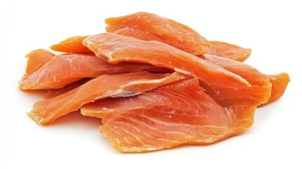 Pile of sliced salmon fillets, presented on a white background.