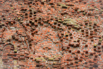 Grunge wall background. Broken brick wall background texture. Textured background of brick wall....
