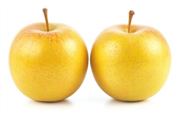 Two ripe, yellow apples, side by side