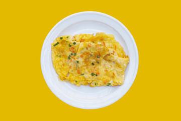 Thai style omelet on white plate