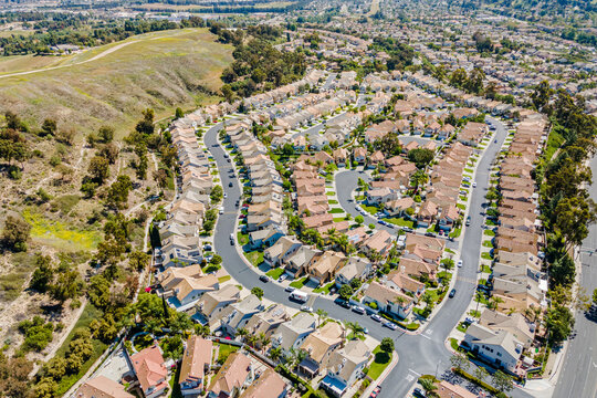 Chino Hills, California &ndash; October  22, 2024: Aerial drone village community photo toward Chino Hills Pkwy and Eucalyptus Ave for homes, houses, streets, and hills
