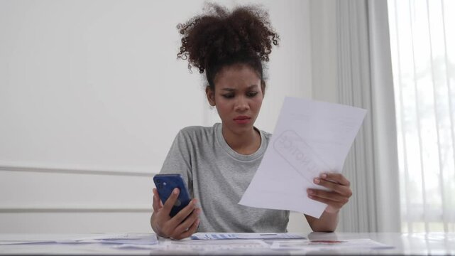 Stressed young woman has financial problems with credit card debt to pay crucial show concept of bad personal money and mortgage pay management crisis.