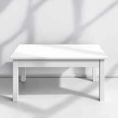 White Rectangular Table Against a Textured White Wall with Shadow and Light
