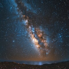 Fototapeta premium A breathtaking starry night sky filled with countless twinkling stars, showcasing a vibrant, swirling galaxy in the distance, radiating hues of purple, blue, and white against the dark canvas.