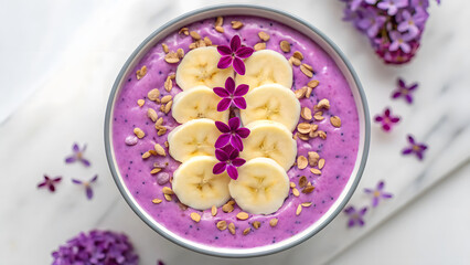 plant-based breakfast vibrant smoothie bowl vibrant purple smoothie bowl topped with banana slices and lilac flowers
