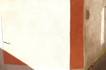 white paper on red wall