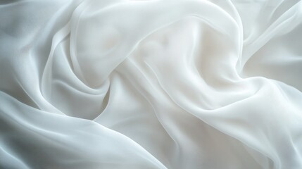 Obraz premium Soft and Flowing White Silk Fabric with Delicate Texture Capturing Light in a Gentle and Elegant Drapery Style for Fashion or Interior Design