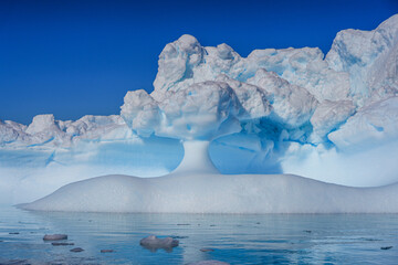 Floating iceberg in the Argentine Islands along the Antarctic Peninsula in the Southern Ocean