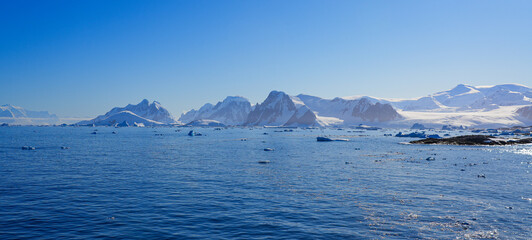 Floating iceberg in the Argentine Islands along the Antarctic Peninsula in the Southern Ocean
