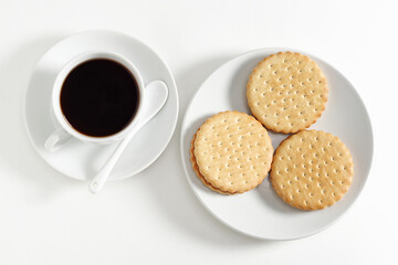 Cookies with filling and coffee