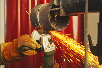 metal sparkles sawing close up, grinding machine