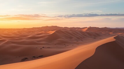 Fototapeta premium Endless Dunes at Sunset, A Serene Desert Landscape in Warm Colors