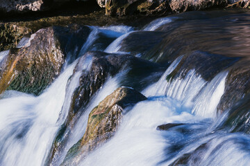 water flowing over rocks