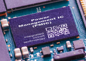 Power Management IC (PMIC) IC managing power distribution and consumption in electronic devices.