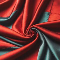 Luxurious Burgundy and Teal Silk Fabric Swirl with Rich Colors