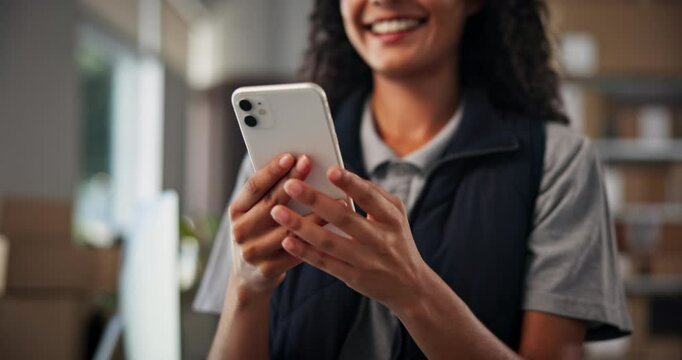 Phone, hands and woman in office for logistics, shipping notification and scroll email. Mobile, warehouse and ecommerce worker online for distribution, smile and chat with business client for order