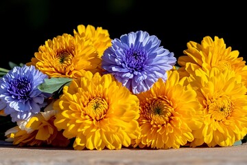 Beautiful arrangement of vibrant yellow and purple flowers captured in bright sunlight