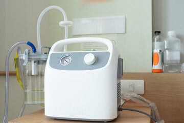 Portable Phlegm Suction, Sputum suction machine from a tube in the throat of a patient who has...