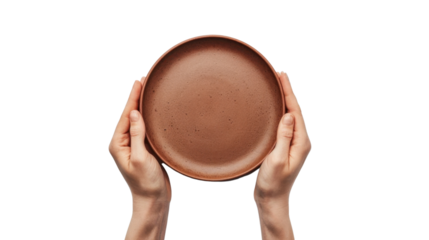 Woman hands holding empty brown ceramic plate on transparent background