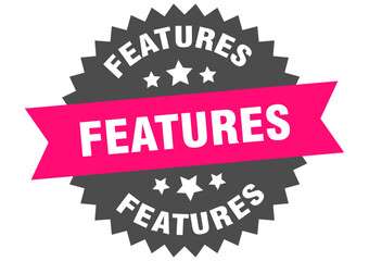 features. features round pink label isolated on transparent background
